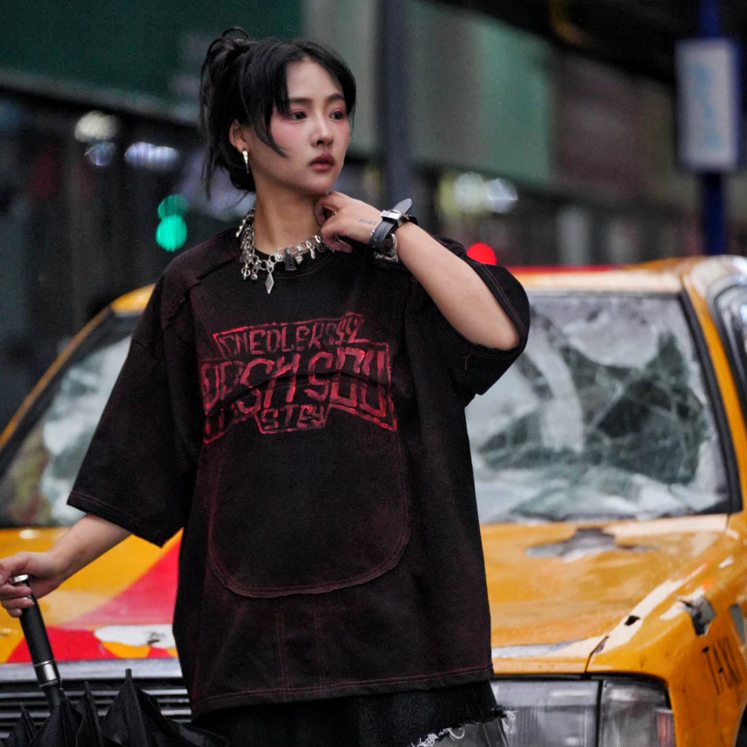 Sanhoostudio oversized short sleeve T-shirt featuring graphic print design and relaxed fit silhouette. Perfect for streetwear outfits with breathable fabric, lightweight feel, and daily casual styling.