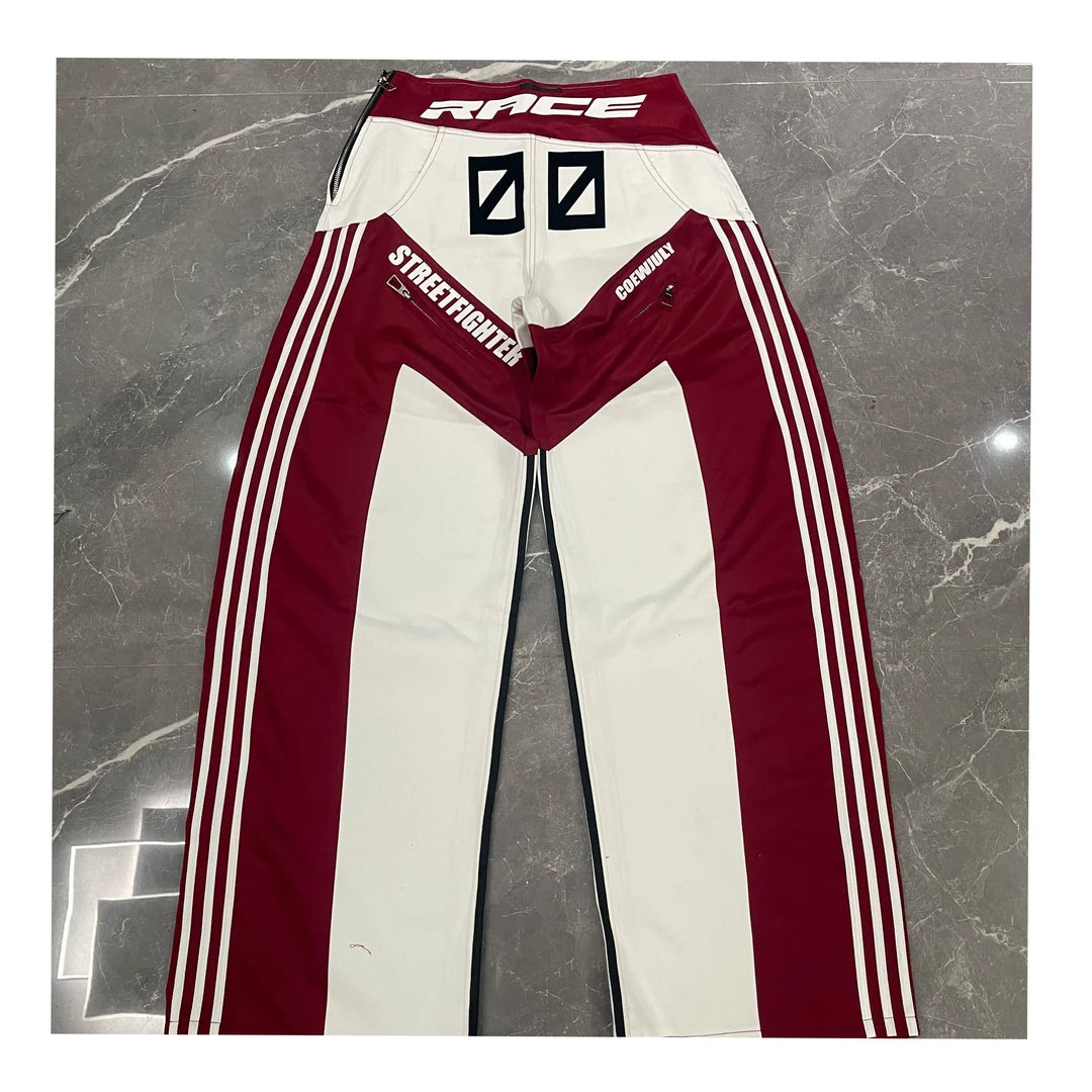 Sanhoostudio racing-inspired jacket featuring heavy patchwork construction and bold motorsport streetwear aesthetics.