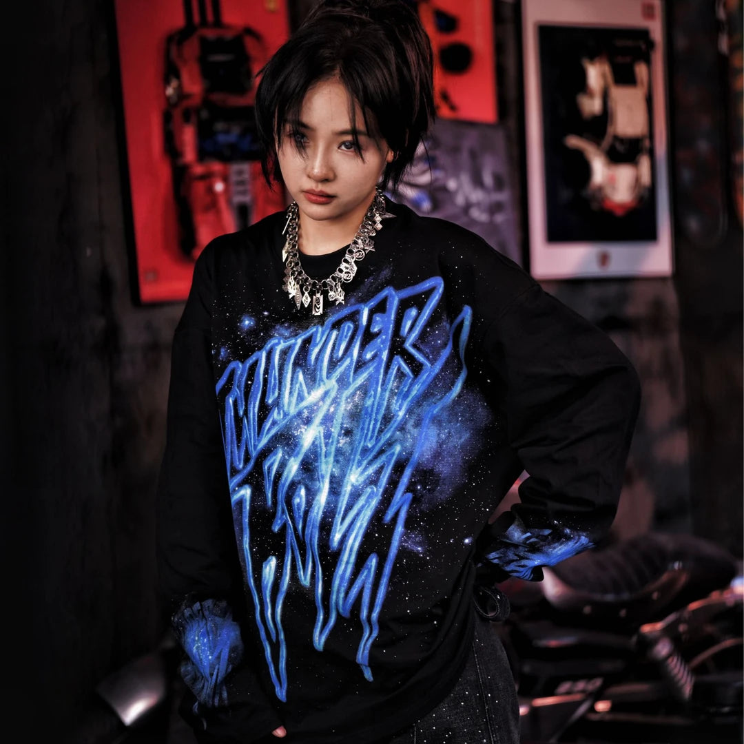 Sanhoostudio long sleeve T-shirt featuring red galaxy-inspired digital graphics, lightweight fabric construction, and a relaxed oversized silhouette. Designed for effortless layering with bold visual impact, breathable everyday comfort, and versatile streetwear styling.
