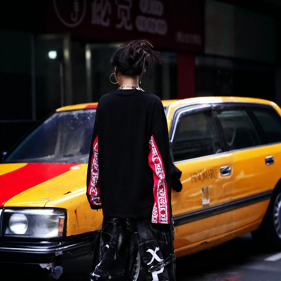 Sanhoostudio short sleeve T-shirt featuring hand-painted graphic artwork, contrast patchwork detailing, and a relaxed oversized silhouette. Designed for expressive streetwear styling with breathable everyday comfort, bold visual texture, and versatile urban appeal.