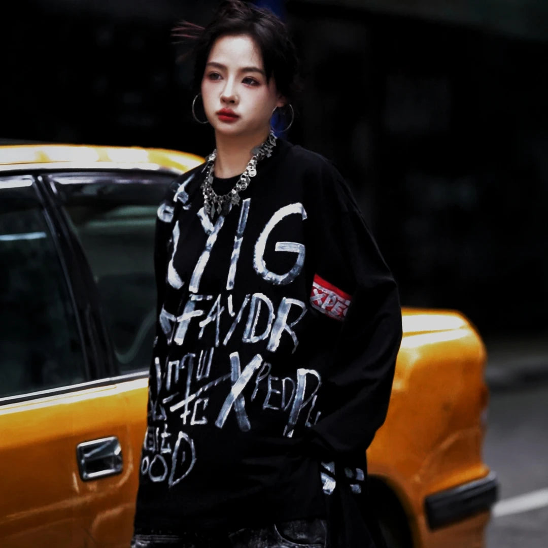 Sanhoostudio short sleeve T-shirt featuring hand-painted graphic artwork, contrast patchwork detailing, and a relaxed oversized silhouette. Designed for expressive streetwear styling with breathable everyday comfort, bold visual texture, and versatile urban appeal.