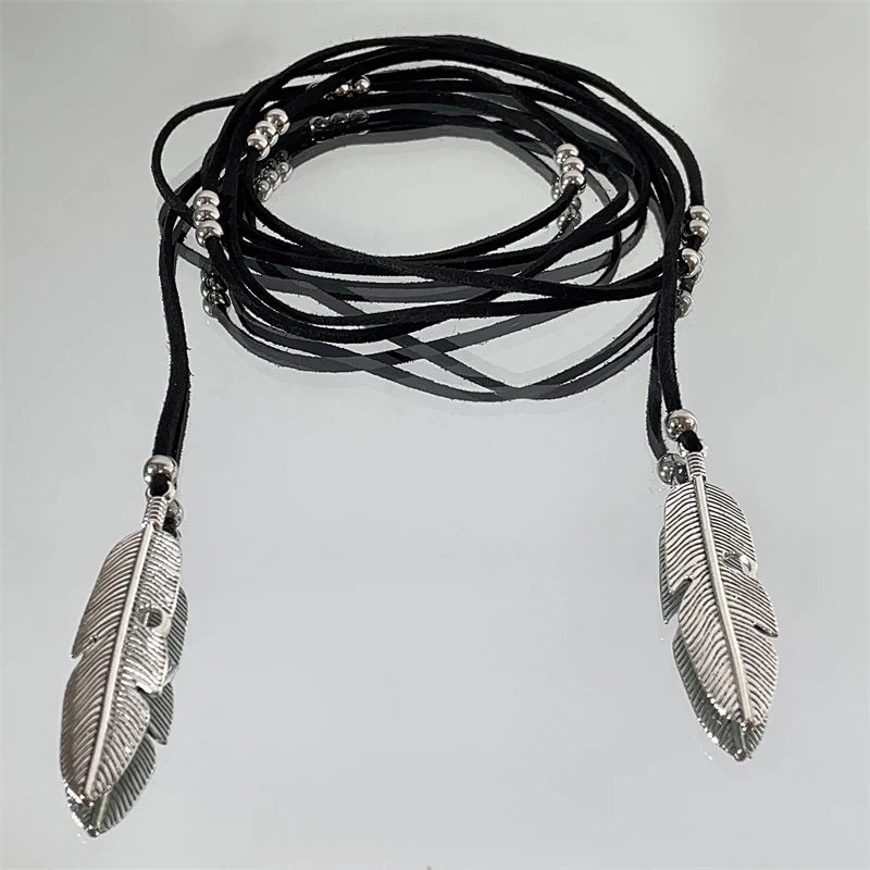 Express effortless Bohemian charm with Sanhoostudio’s silver heart wrap necklace. The long leather cord design combines vintage texture with modern simplicity.