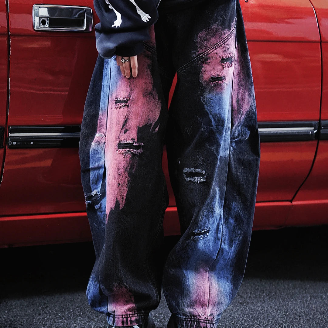 Blade-cut washed denim pants with a wide-leg fit for a relaxed streetwear silhouette. Stylish, comfortable, and perfect for daily outfits.