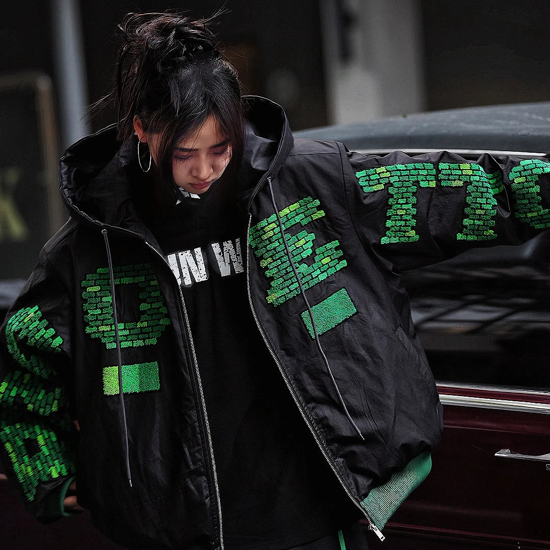 Sanhoostudio heavyweight hooded jacket features handcrafted patchwork details, a relaxed oversized fit, and a double-breasted front. Designed for winter warmth with bold street attitude.