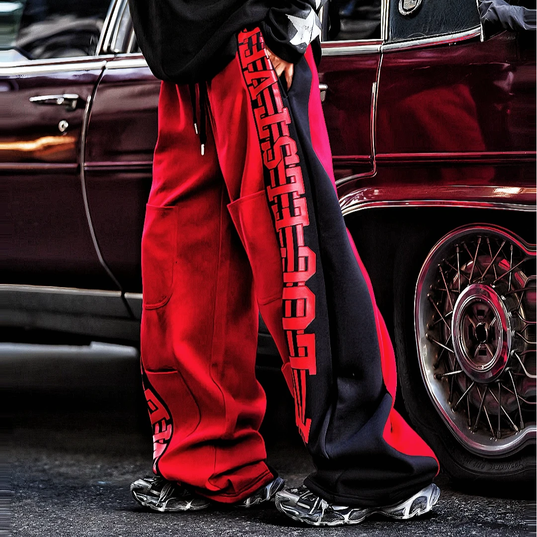 Sanhoostudio fleece-lined wide-leg pants made from cotton-poly blend. Designed with vintage stripe print, high-waist cut, and oversized silhouette for warmth and effortless street versatility.