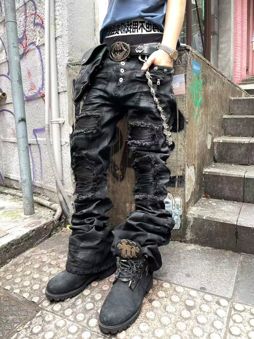Sanhoostudio wax-finished denim pants made from breathable 100% cotton. Designed with curved cutting, distressed paneling, subtle stretch feel, and straight-leg silhouette for a bold dark street aesthetic.