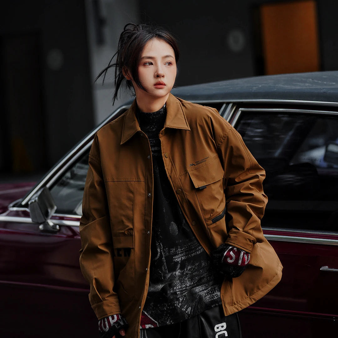 Sanhoostudio long sleeve workwear shirt jacket with clean structure and relaxed silhouette. Designed as a unisex layering piece for spring and fall streetwear.