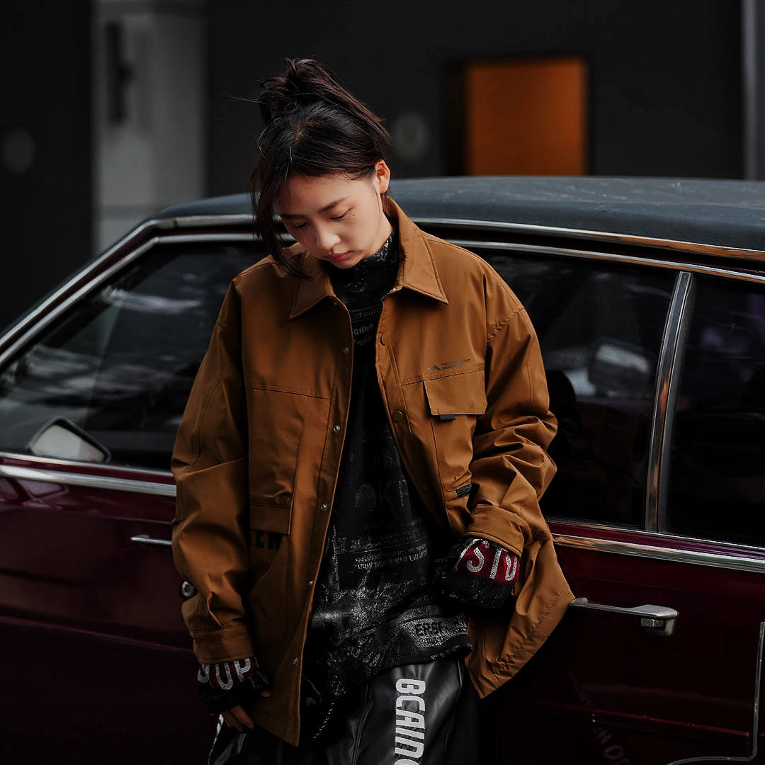 Sanhoostudio long sleeve workwear shirt jacket with clean structure and relaxed silhouette. Designed as a unisex layering piece for spring and fall streetwear.