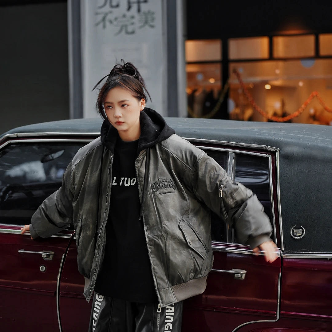 Sanhoostudio hooded leather jacket featuring distressed texture, colorblock panels, and utility pockets. Built for winter streetwear with bold high-street attitude.