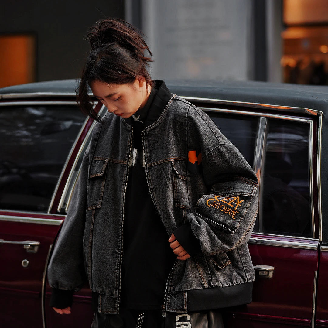 Sanhoostudio washed denim varsity jacket featuring contrast paneling and relaxed fit. A timeless unisex jacket for everyday streetwear layering.