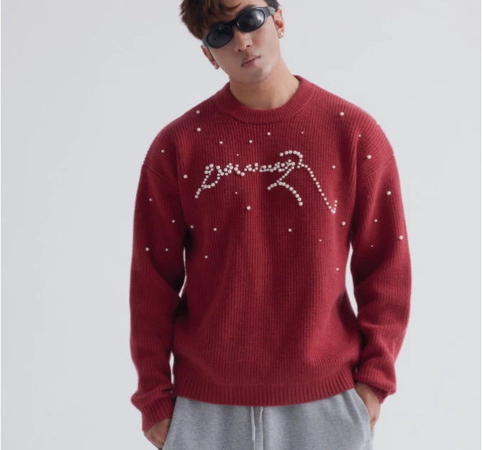 Sanhoostudio knit sweater featuring stud details and a relaxed fit. Designed for unisex autumn and winter streetwear layering.