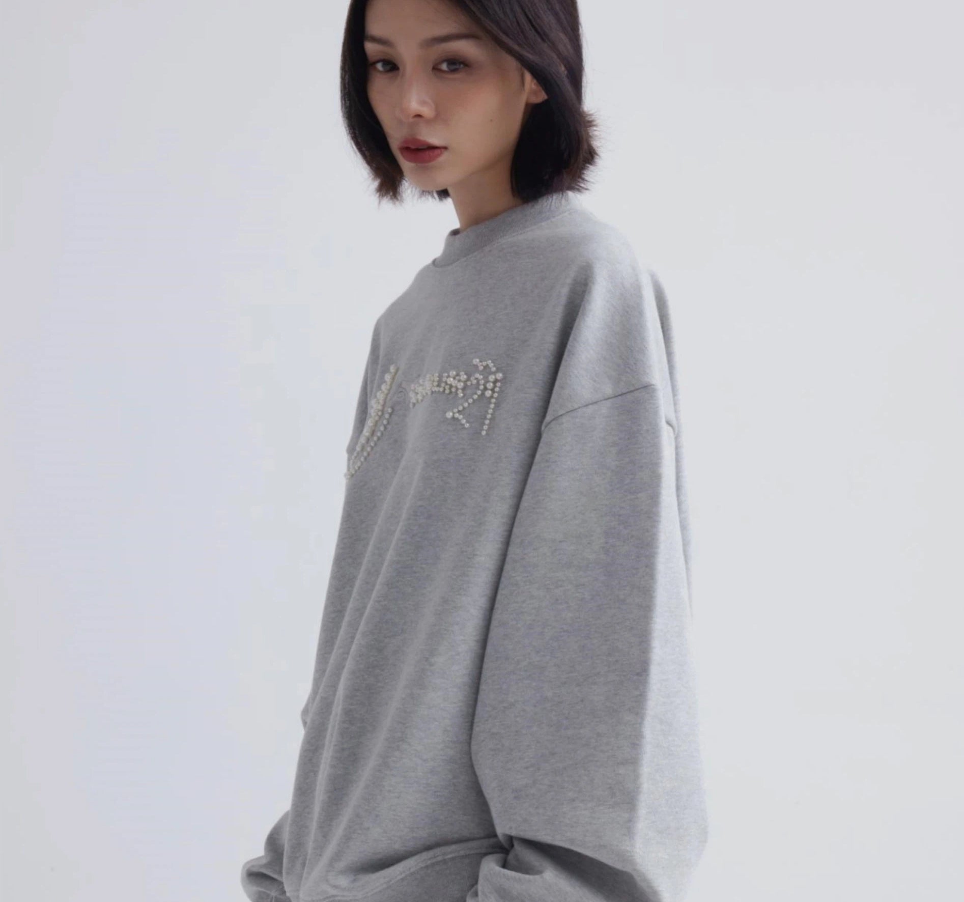 Sanhoostudio oversized crewneck sweatshirt designed for relaxed unisex streetwear and everyday layering.