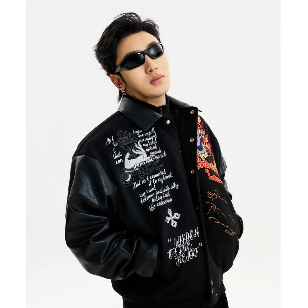 Sanhoostudio heavyweight varsity jacket inspired by American vintage streetwear. Designed with a warm structure and relaxed fit for unisex winter styling and urban fashion looks.