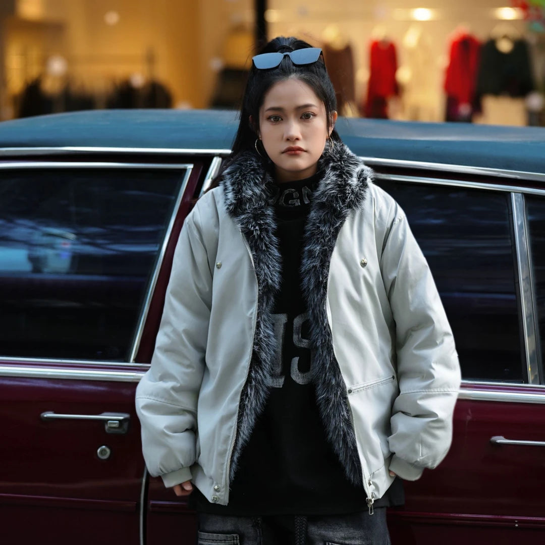 Sanhoostudio padded jacket featuring a hooded design, distressed raw-edge details, and a loose workwear silhouette. Built for winter warmth with versatile streetwear styling.