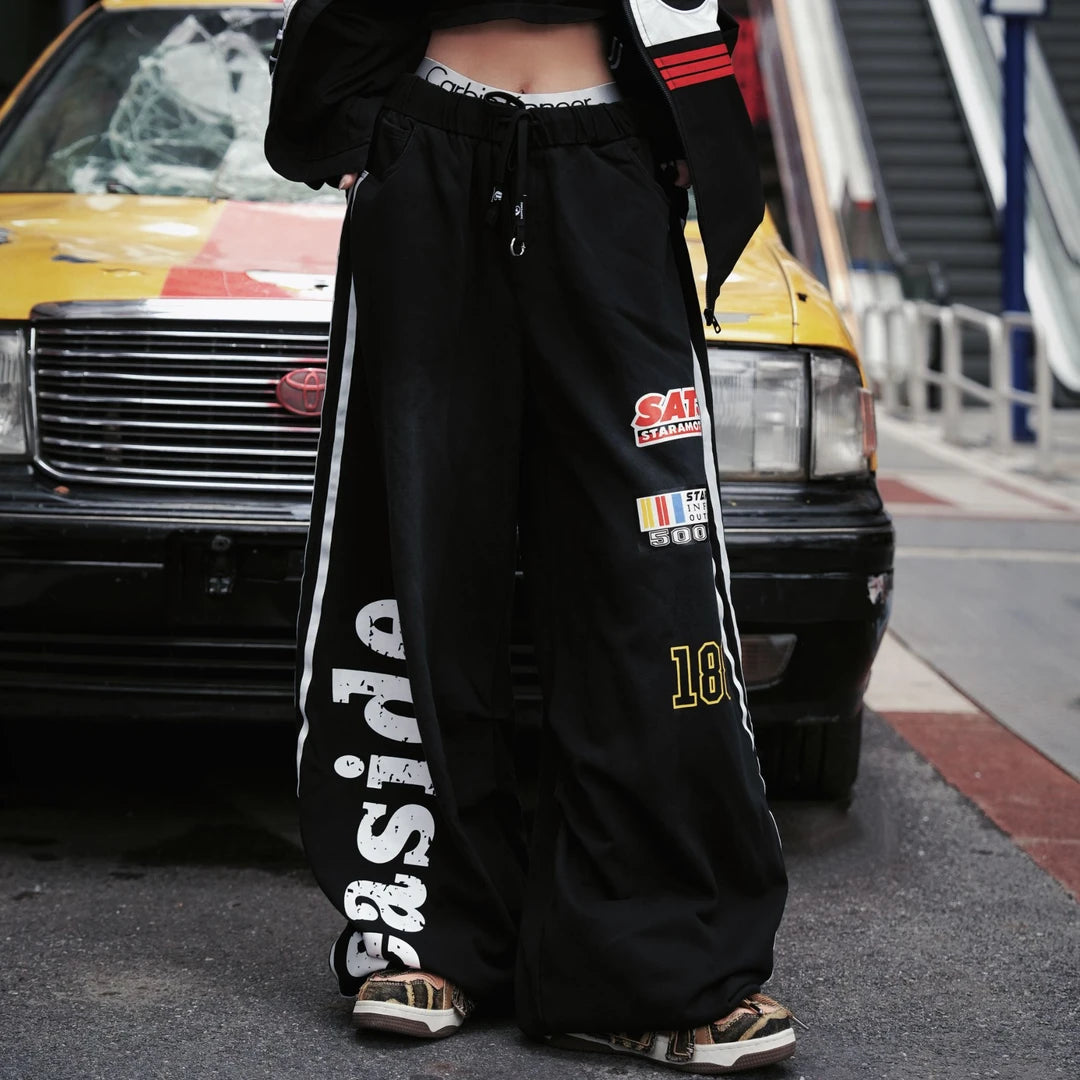 Sanhoostudio wide leg sweatpants designed with relaxed streetwear silhouette inspired by hip hop fashion and urban style.
