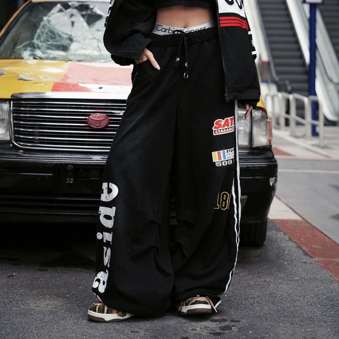 Sanhoostudio wide leg sweatpants designed with relaxed streetwear silhouette inspired by hip hop fashion and urban style.