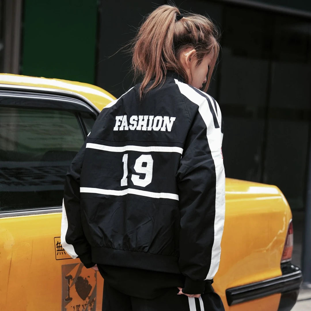 Sanhoostudio retro racing jacket inspired by vintage motorsport culture with relaxed streetwear silhouette.