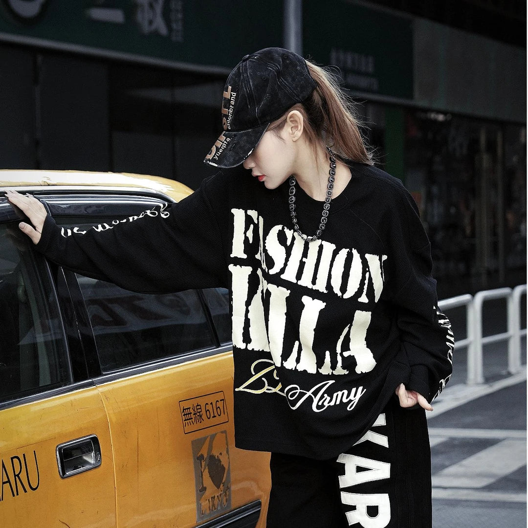 Sanhoostudio long sleeve T-shirt featuring graffiti letter print and vintage streetwear design for everyday urban styling.