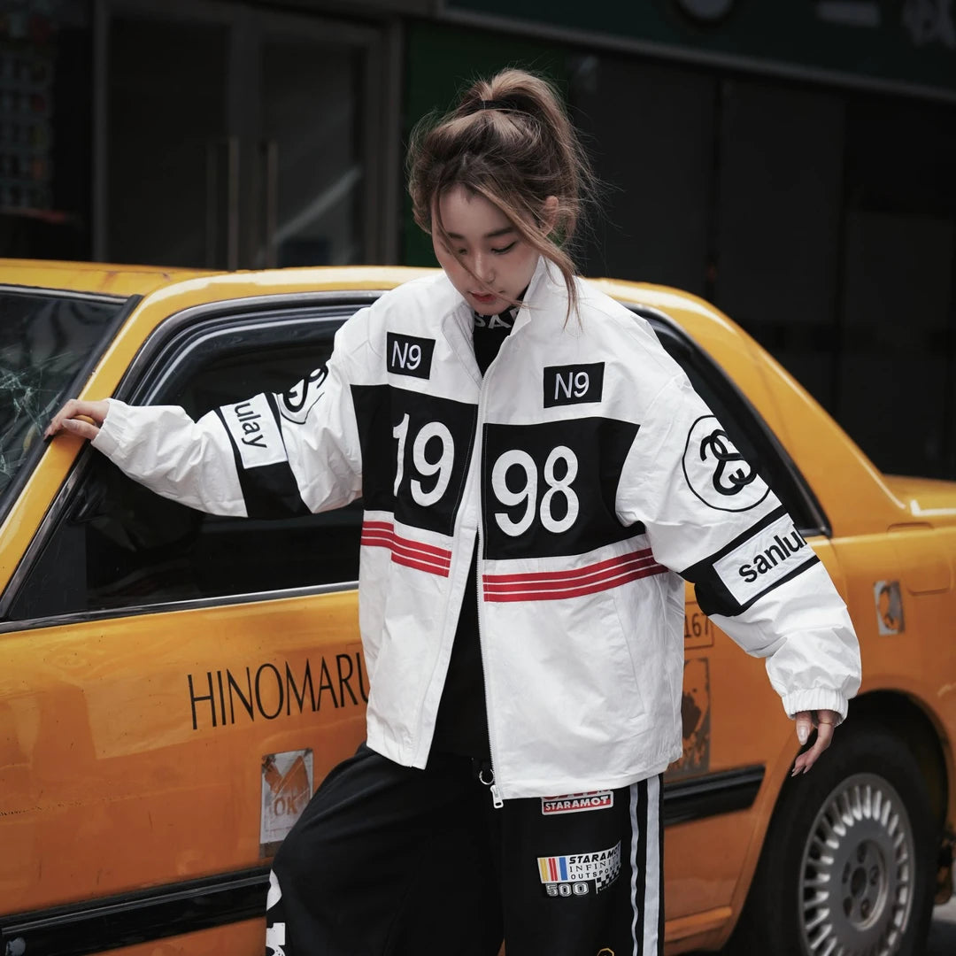 Sanhoostudio varsity jacket featuring heavy embroidery and biker-inspired design for bold streetwear outfits.