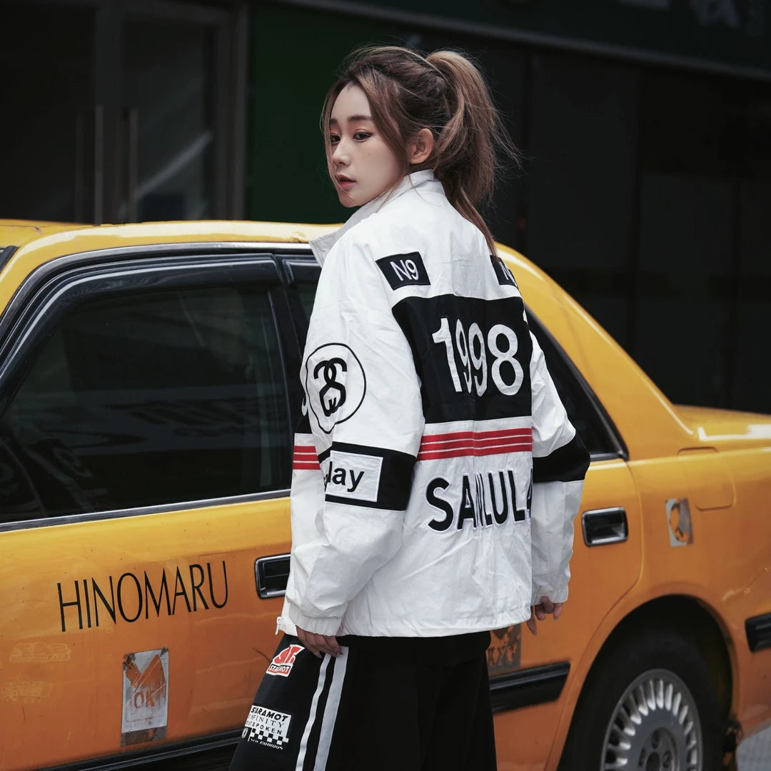 Sanhoostudio varsity jacket featuring heavy embroidery and biker-inspired design for bold streetwear outfits.