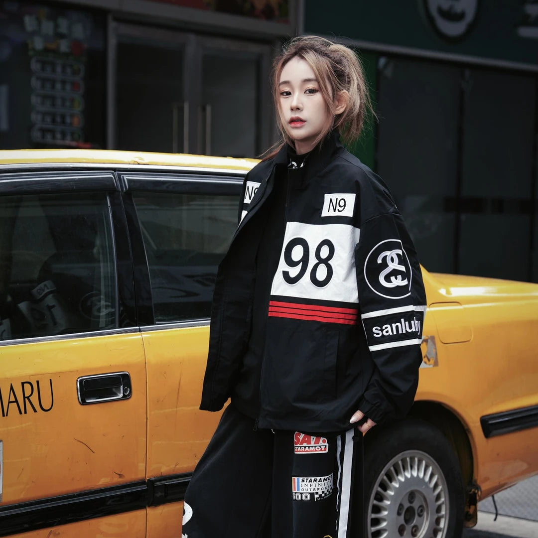 Sanhoostudio varsity jacket featuring heavy embroidery and biker-inspired design for bold streetwear outfits.