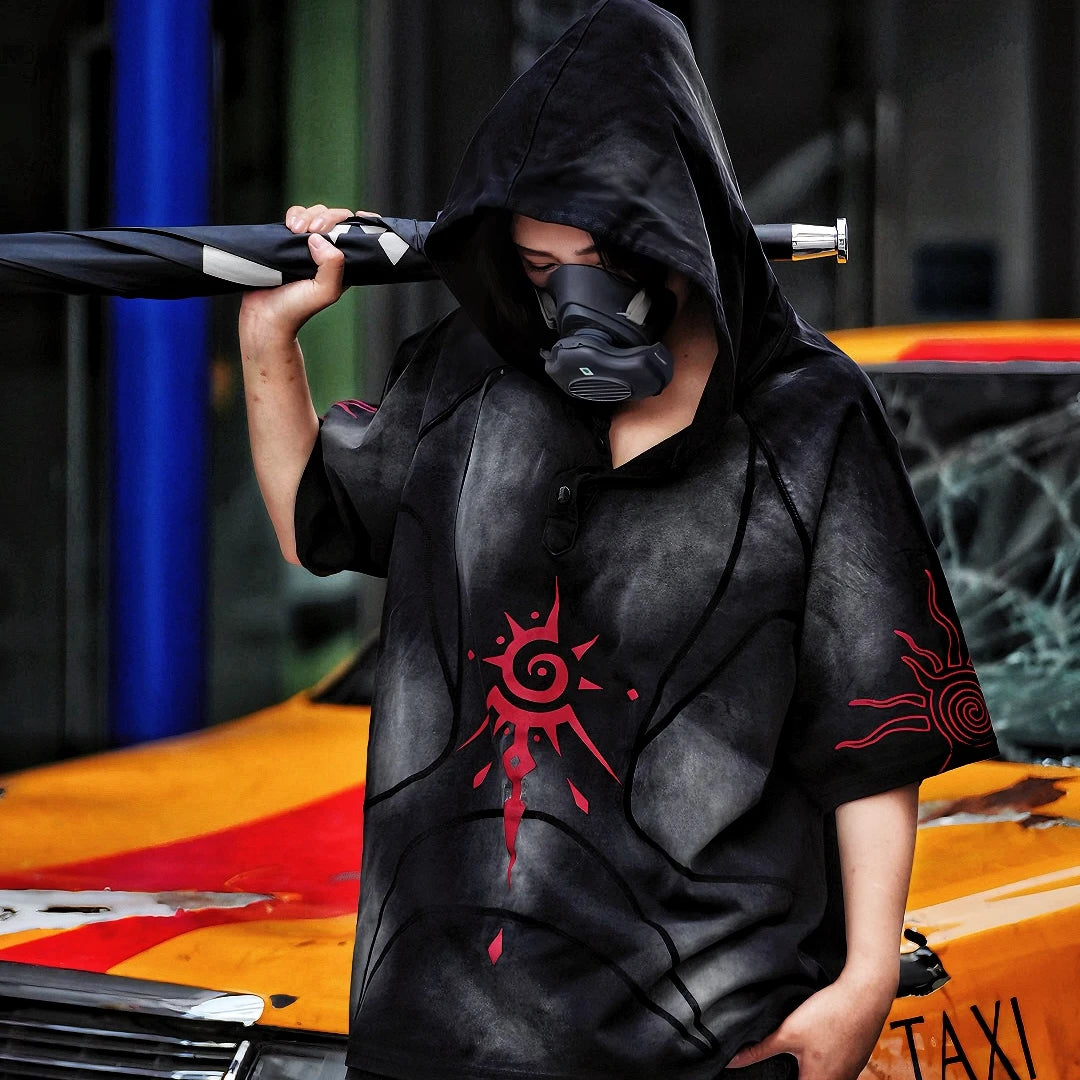 Sanhoostudio hooded T-shirt featuring graffiti print, patchwork construction, and relaxed fit for bold streetwear outfits.