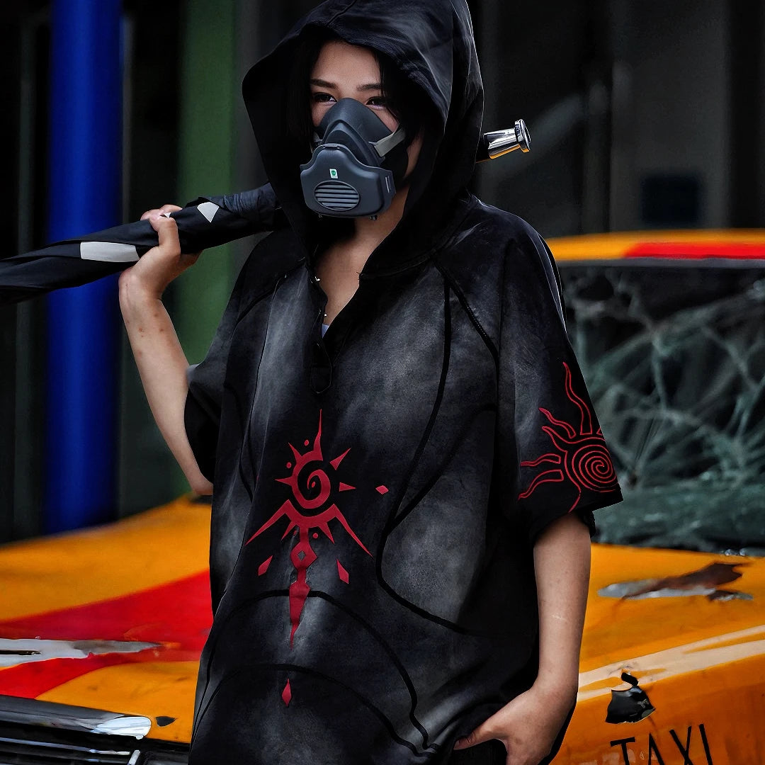 Sanhoostudio hooded T-shirt featuring graffiti print, patchwork construction, and relaxed fit for bold streetwear outfits.