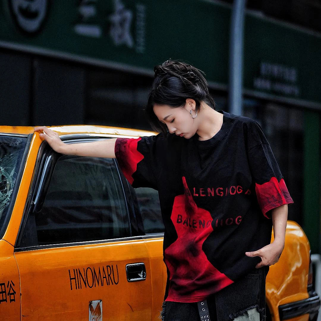 Sanhoostudio short sleeve T-shirt featuring colorblock design, deconstructed cut, and relaxed fit silhouette for modern streetwear outfits.