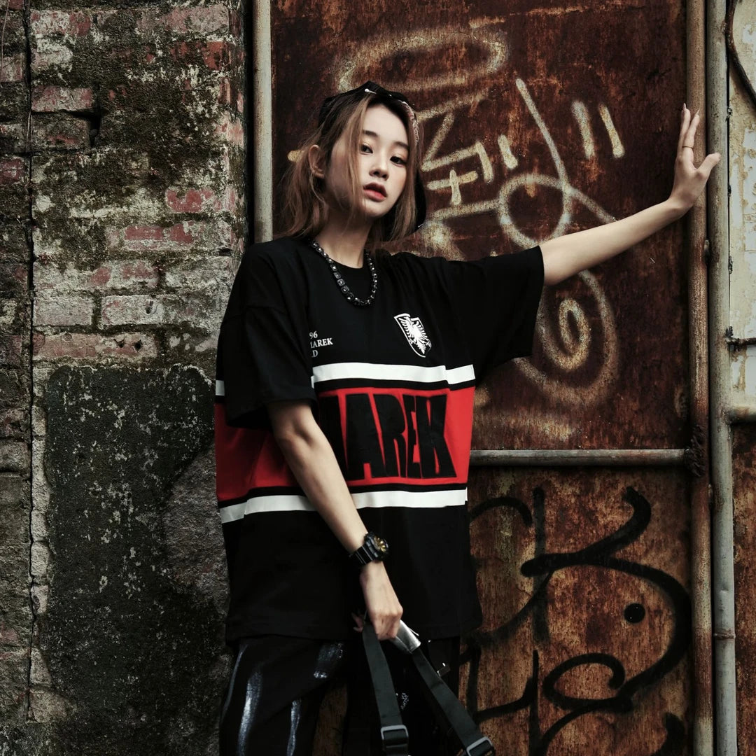 Sanhoostudio T-shirt featuring striped pattern and embroidered details with a relaxed fit for clean streetwear styling.