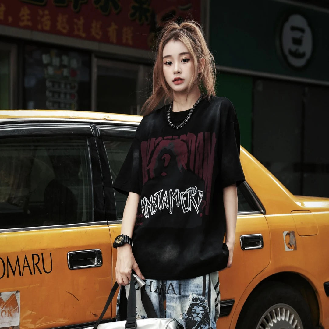 Sanhoostudio oversized T-shirt featuring distressed finish, printed design, and relaxed fit for bold streetwear styling.