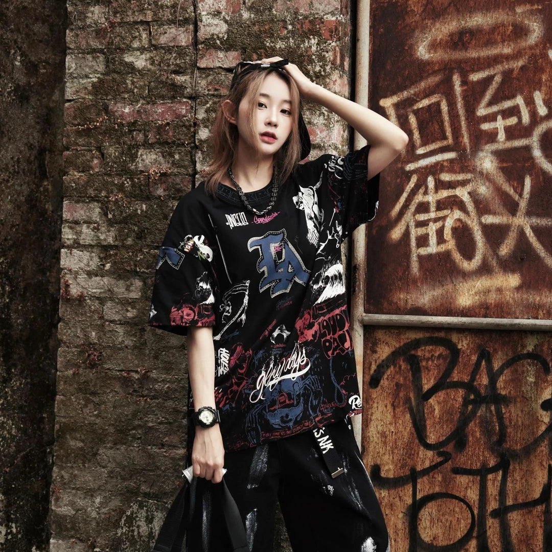 Sanhoostudio T-shirt featuring skull graphic, graffiti design, and distressed wash for standout streetwear outfits.