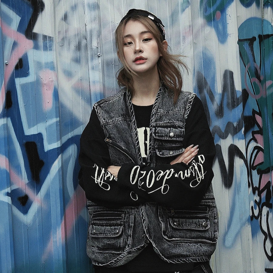 Sanhoostudio utility vest featuring multi-pocket design, distressed wash, and relaxed fit for functional streetwear styling.