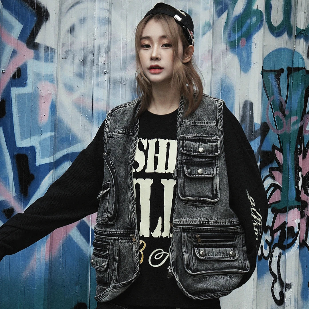 Sanhoostudio utility vest featuring multi-pocket design, distressed wash, and relaxed fit for functional streetwear styling.