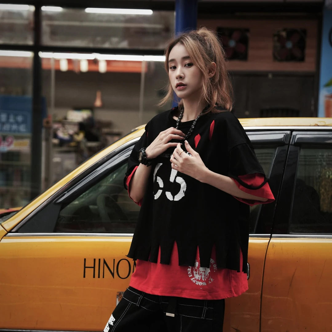 Sanhoostudio short sleeve T-shirt featuring distressed finish, ripped details, and relaxed fit design. Built for bold streetwear styling with a vintage-inspired aesthetic.