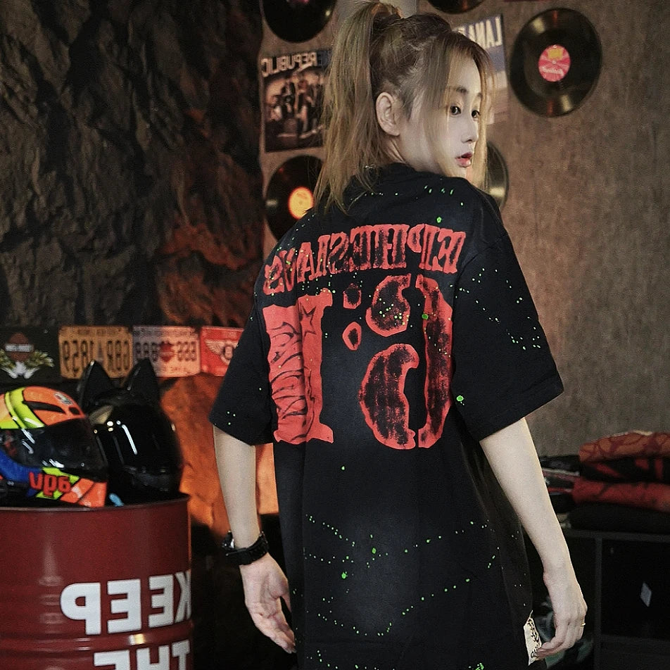 Sanhoostudio short sleeve T-shirt featuring letter print design and relaxed fit silhouette. Designed for everyday streetwear outfits with clean styling and comfortable wear.
