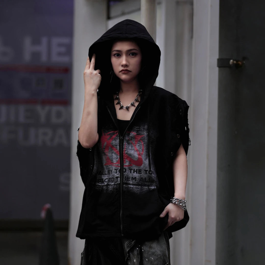 Sanhoostudio hooded vest featuring distressed finish, printed graphics, and sleeveless construction. Designed for layering in streetwear outfits, offering lightweight comfort, flexibility, and a strong modern utility aesthetic.