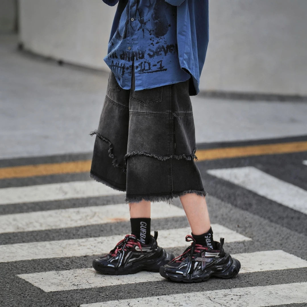 Sanhoostudio denim shorts featuring distressed wash, wide leg silhouette, and relaxed fit design. Perfect for summer streetwear outfits with comfort, durability, and versatile styling.