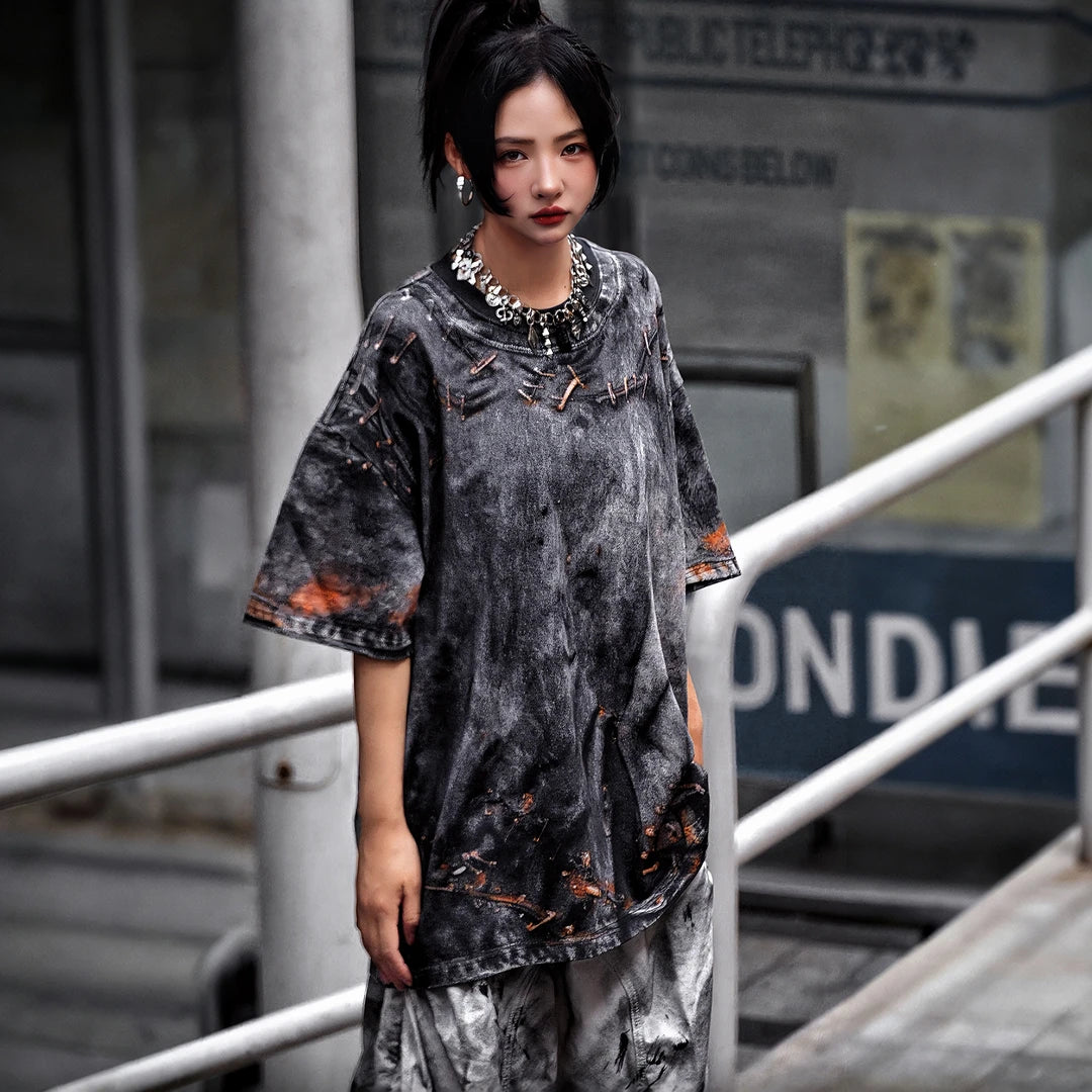 Sanhoostudio short sleeve T-shirt featuring graphic print design and oversized fit silhouette. Designed for modern streetwear outfits with breathable comfort, lightweight feel, and versatile everyday styling.