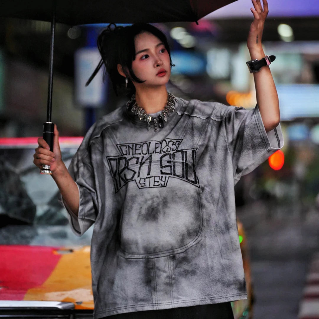 Sanhoostudio oversized short sleeve T-shirt featuring graphic print design and relaxed fit silhouette. Perfect for streetwear outfits with breathable fabric, lightweight feel, and daily casual styling.