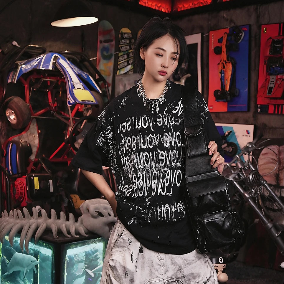 Sanhoostudio short sleeve T-shirt featuring patchwork design and graphic print with a relaxed fit silhouette. A versatile streetwear piece for daily styling with comfort and breathable fabric.