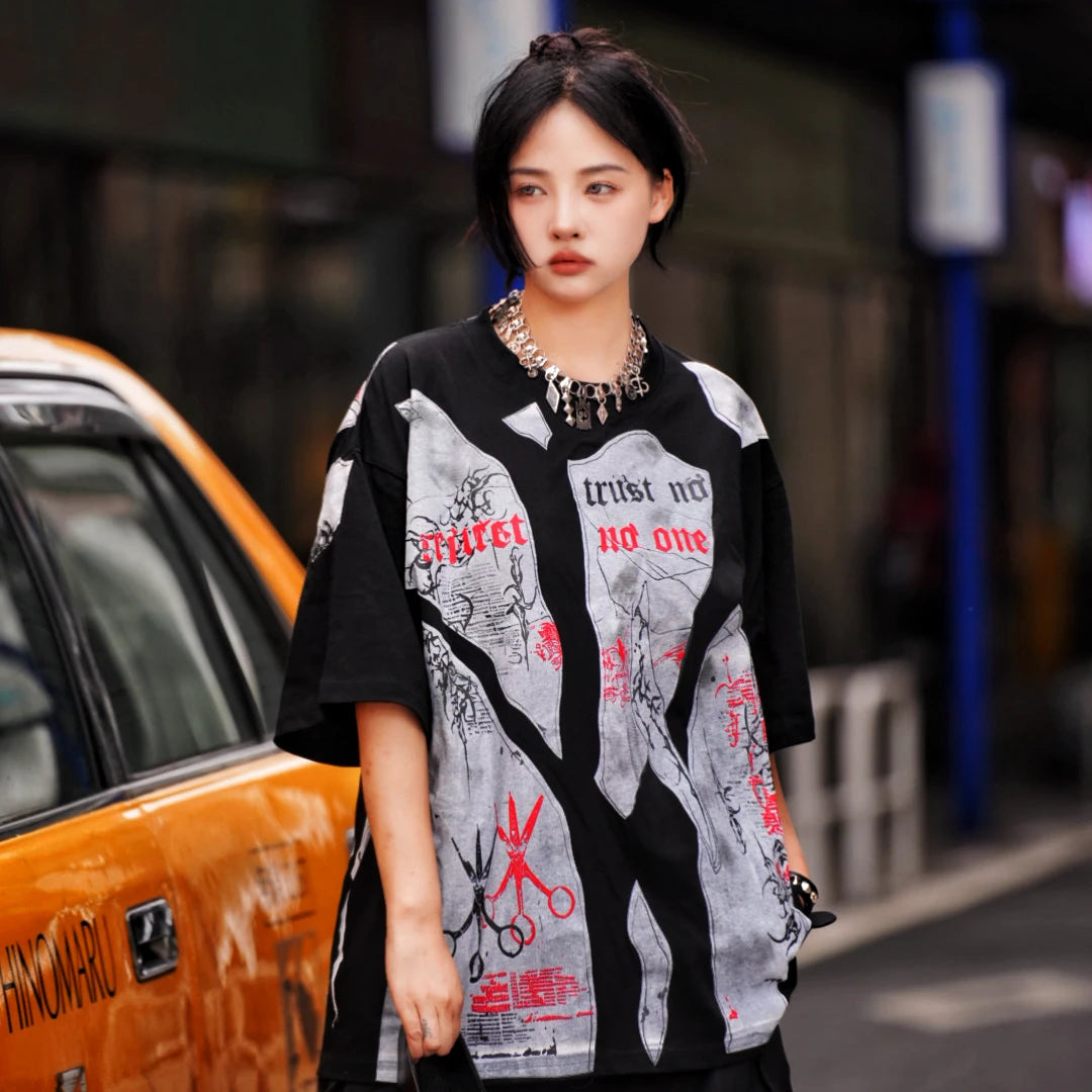 Sanhoostudio short sleeve T-shirt featuring patchwork construction, graphic print design, and oversized fit silhouette. Built for modern streetwear outfits with breathable comfort and everyday versatility.