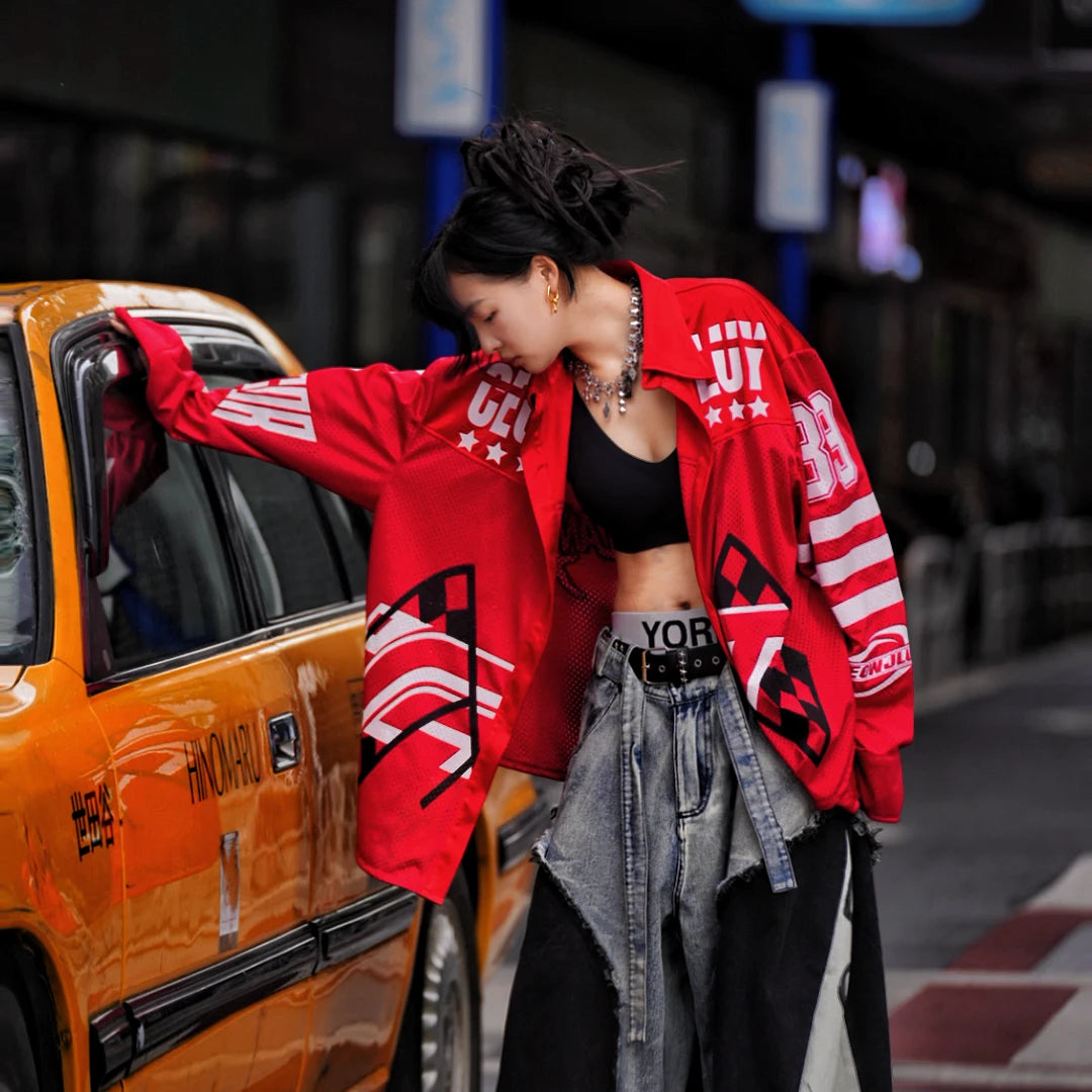 Sanhoostudio long sleeve T-shirt featuring graphic print design, lightweight breathable fabric, and relaxed oversized fit. Designed for summer streetwear styling with sun protection and comfortable daily wear.