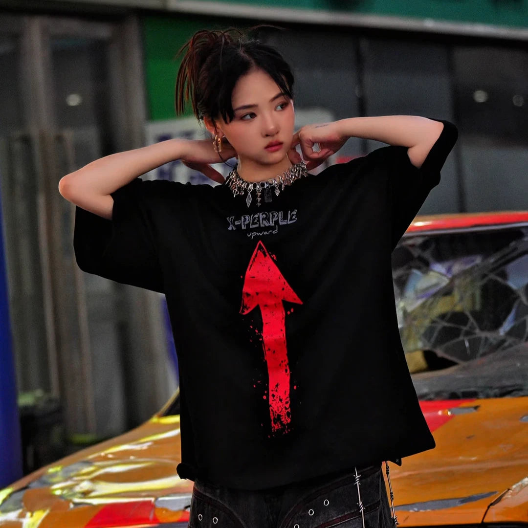 Sanhoostudio short sleeve T-shirt featuring arrow-inspired spray print graphics and a relaxed oversized fit. Designed for summer streetwear styling with breathable comfort and bold visual character.