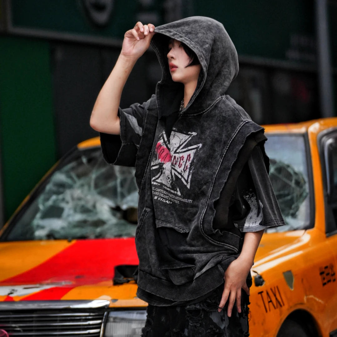 Sanhoostudio hooded T-shirt featuring all-over graffiti artwork, heavyweight fabric construction, and a relaxed oversized silhouette. Built for contemporary streetwear outfits with bold visual expression and everyday comfort.