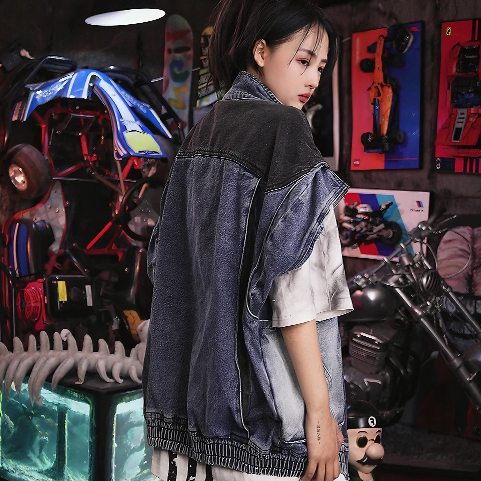 Sanhoostudio denim jacket featuring hand-painted graffiti artwork, distressed wash treatment, mud-dye effects, and an oversized silhouette. Designed for premium streetwear styling with strong visual character and versatile layering appeal.