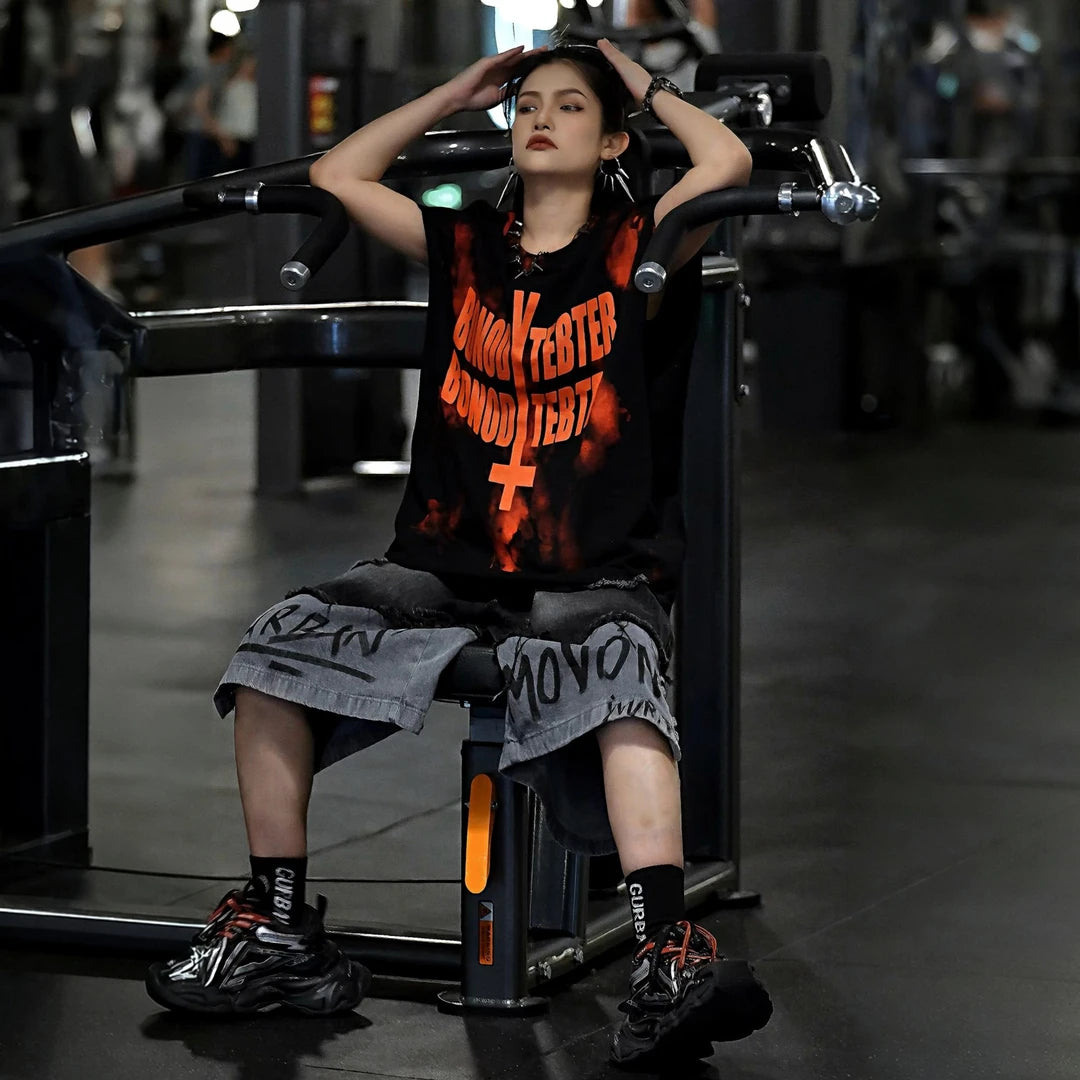 Sanhoostudio sleeveless T-shirt featuring distressed detailing, red spray-print artwork, and a relaxed oversized fit. Designed for summer streetwear styling with breathable comfort and a bold urban aesthetic.