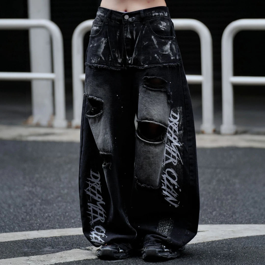 Sanhoostudio wide leg pants featuring heavyweight graphic print detailing and a relaxed loose-fit silhouette. Designed for modern streetwear outfits with comfortable drape, lightweight summer wearability, and standout visual appeal.