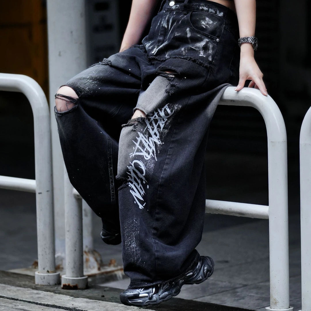 Sanhoostudio wide leg pants featuring heavyweight graphic print detailing and a relaxed loose-fit silhouette. Designed for modern streetwear outfits with comfortable drape, lightweight summer wearability, and standout visual appeal.