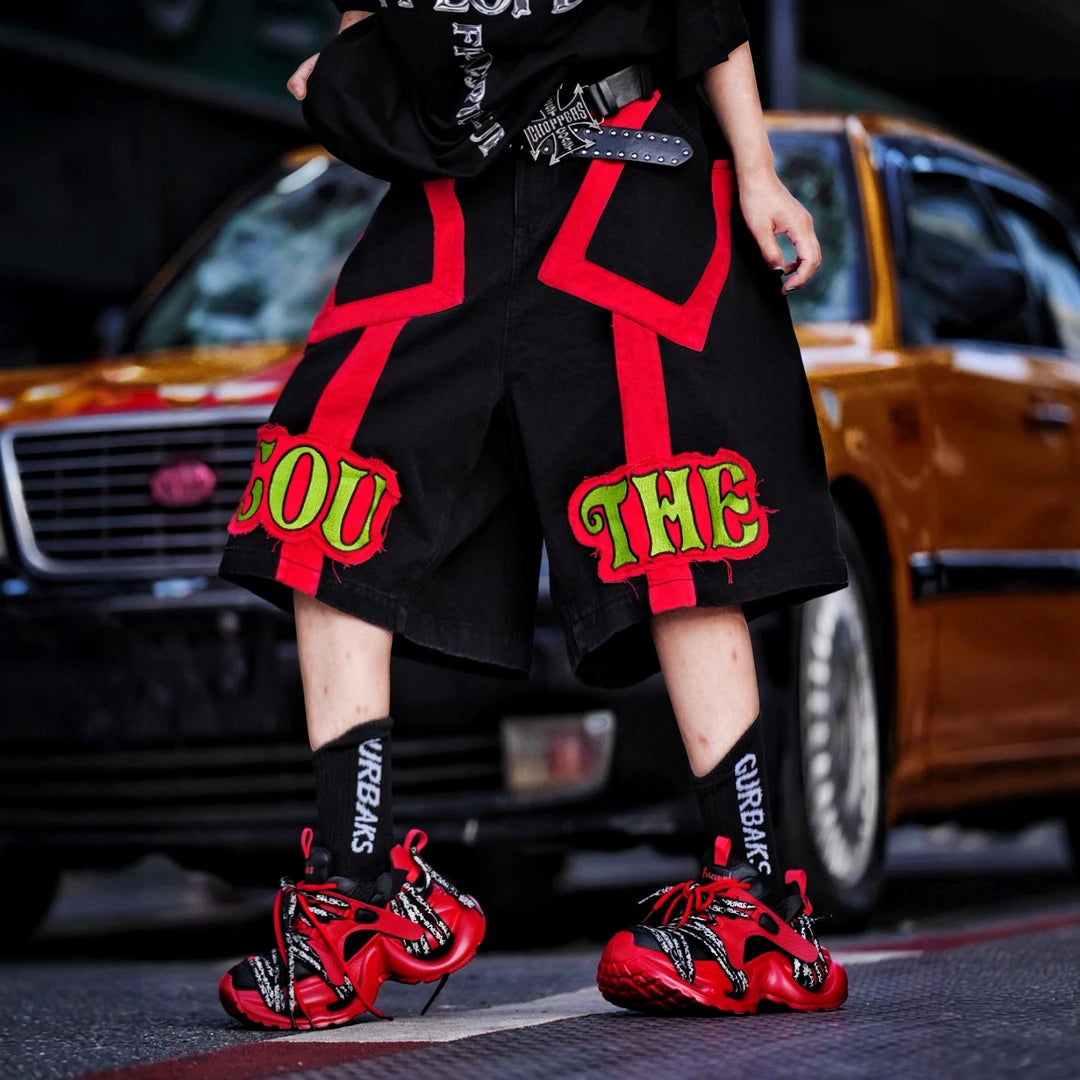 Sanhoostudio denim pants featuring distressed wash treatment, patchwork construction, and a wide leg scythe-cut silhouette. Built for modern streetwear outfits with relaxed comfort and premium everyday styling.