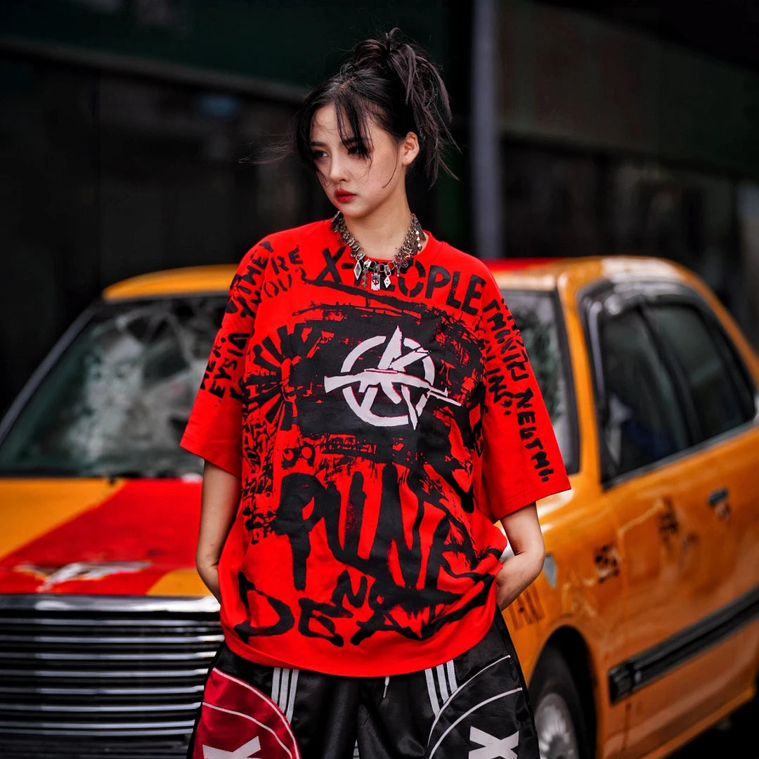 Sanhoostudio short sleeve T-shirt featuring spray-print artwork, breathable fabric construction, and an oversized fit silhouette. Designed for modern streetwear styling with comfort and standout summer appeal.